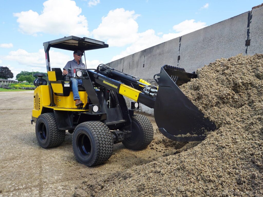Compact Articulated Loader on Dairy Farm