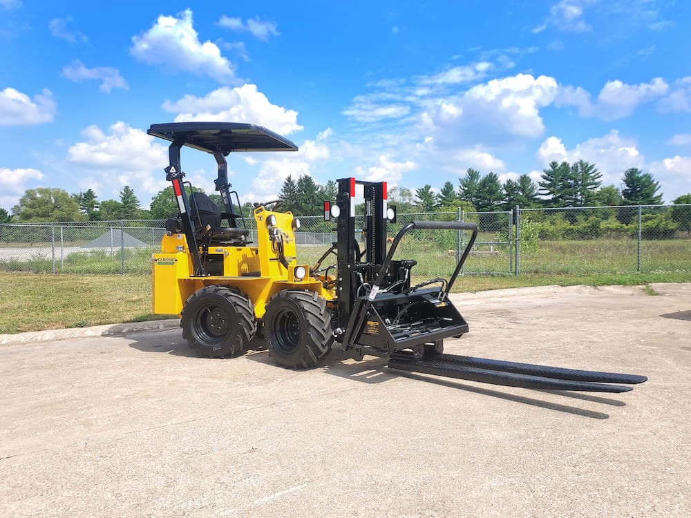 Forklift with Jaws Attachment